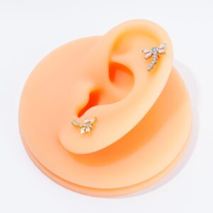 Silicone ear model displaying the Crystal Dragonfly Stud placed in the Helix and Upper Lobe piercing positions.