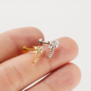 Fingers holding Gold and Silver Titanium Dragonfly Ear Studs to demonstrate the scale and side profile of the flat back labret.