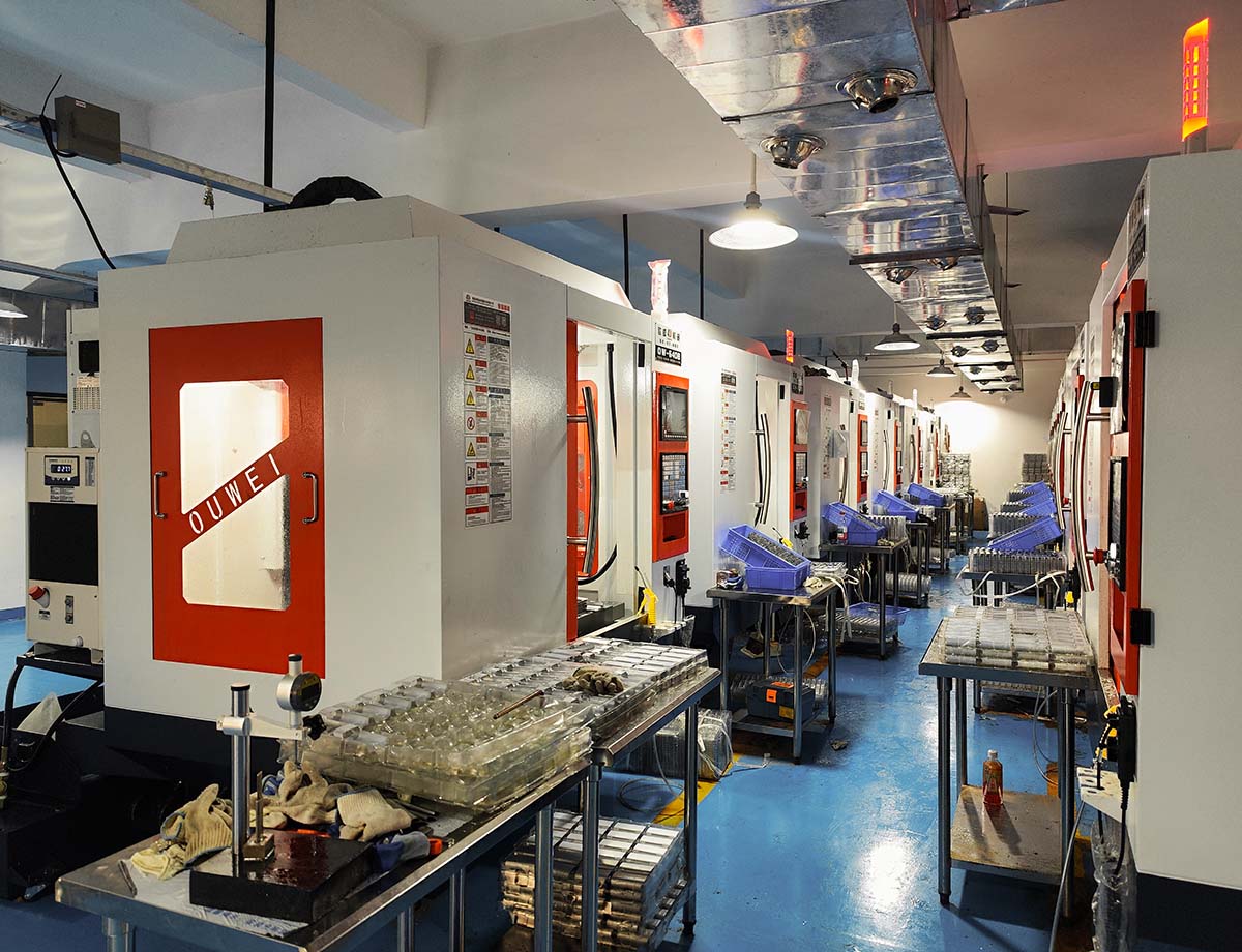 Automatic CNC lathe machining titanium parts at GTCC body piercing jewelry factory.